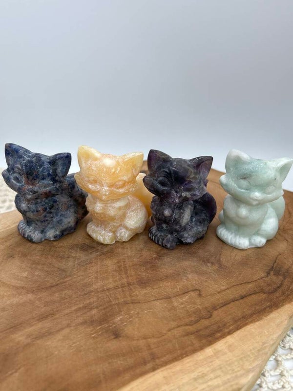 Katzen Carvings
