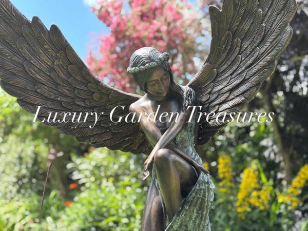 Bronze angel on marble base