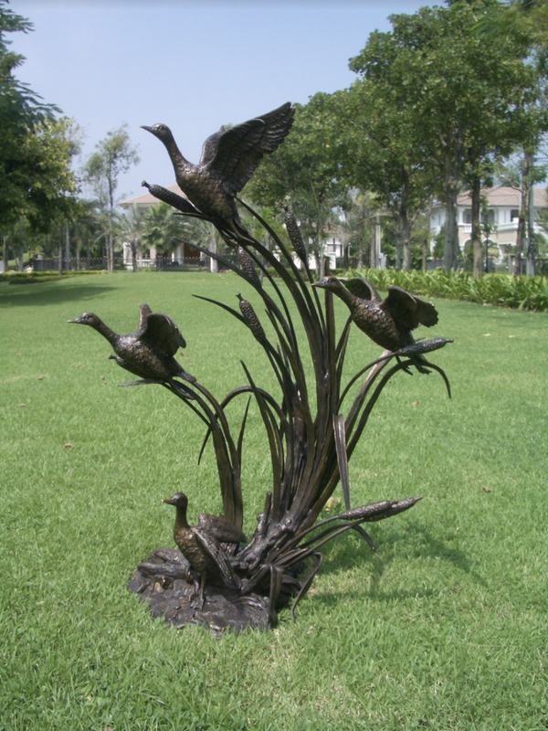Bronze  wild Ducks in Flight
