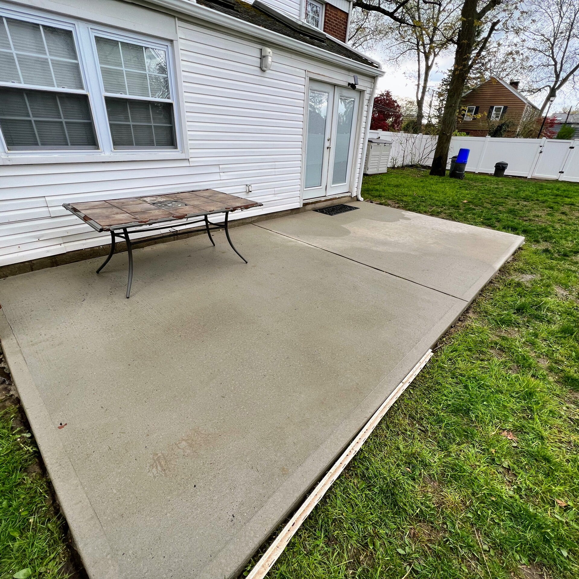 Brick walkway before and after stain and mildew removal