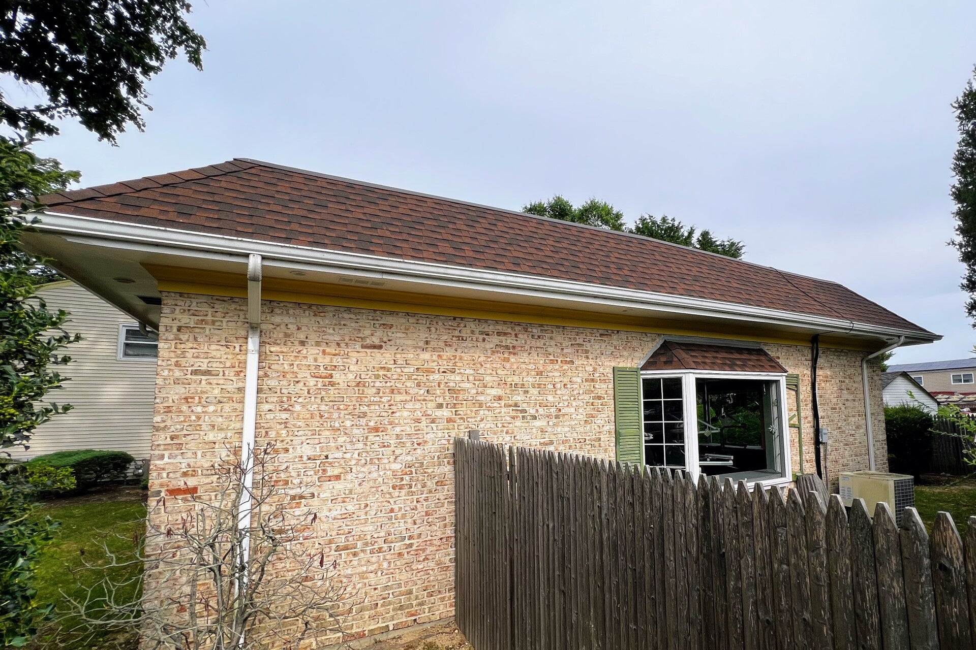 Home exterior and roof after soft washing