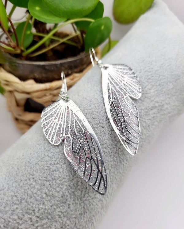 Boucles " ailes papillons argentée "