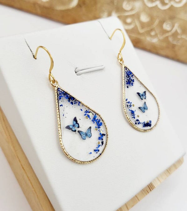 Boucles " Gouttes transparentes papillon bleu "