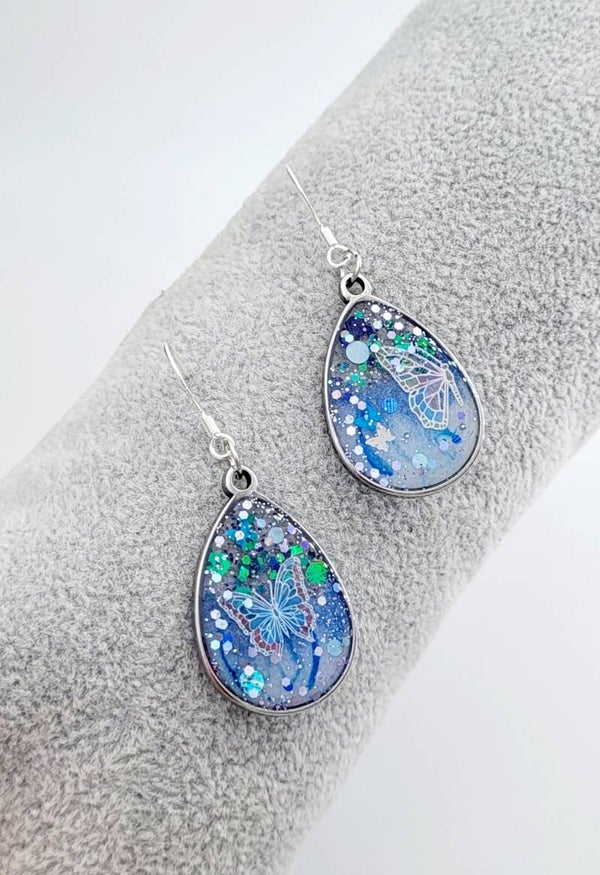 Boucles " Gouttes papillons bleus pailletés "