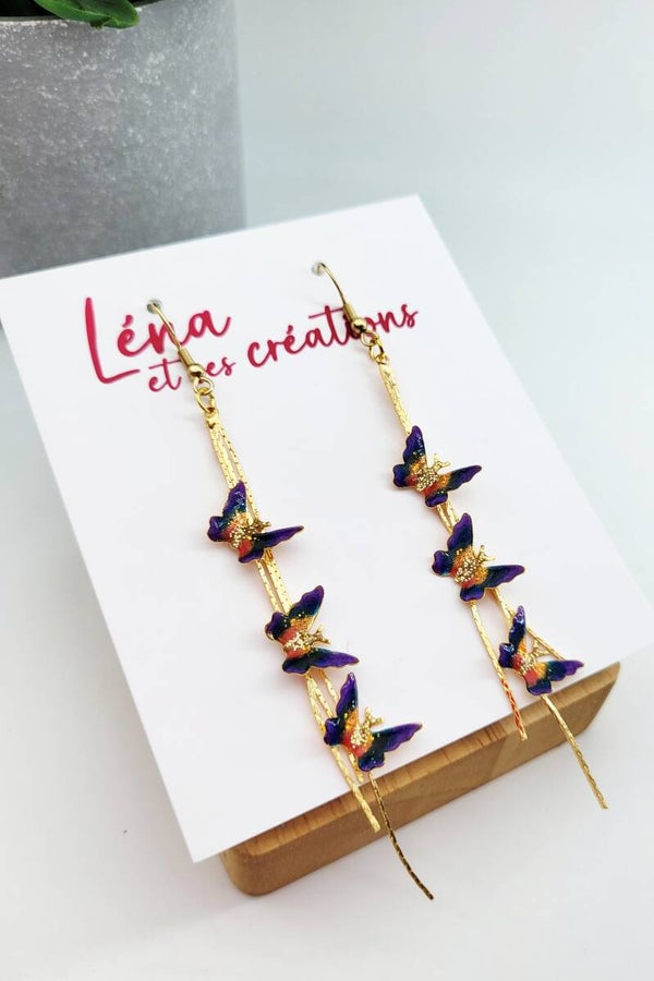 Boucles " Papillons oranges mauves"