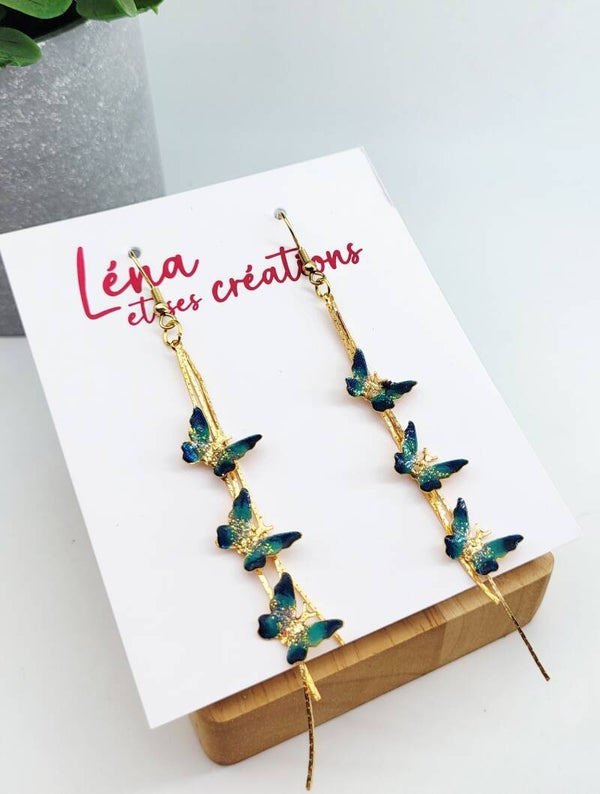 Boucles " Papillons bleu turquoise "