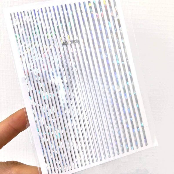 Stickervel zilvere holografische lijnen
