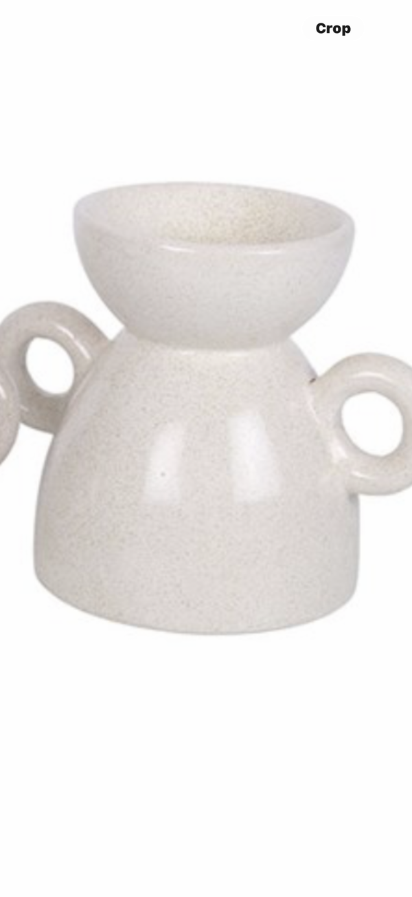 Beige/neutral handled wax melter.