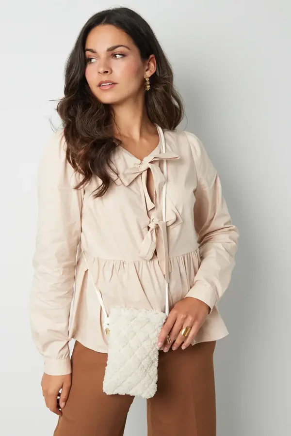 Zachte telefoontas met teddy look