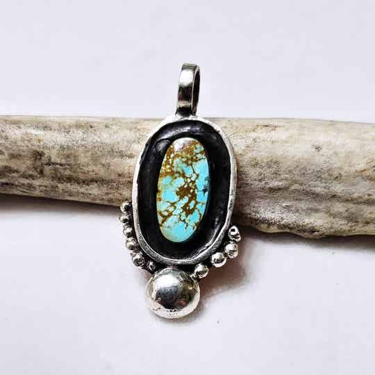 King manassa shadow pendant