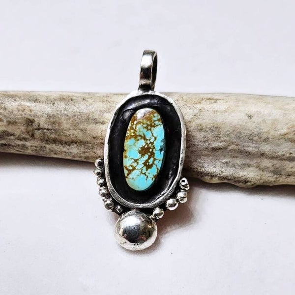 King manassa shadow pendant