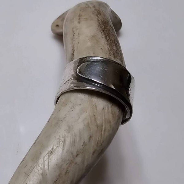 Overlapping silver ring