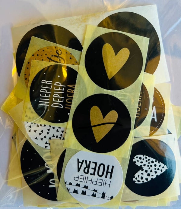 50 stickers zwart / wit / goud