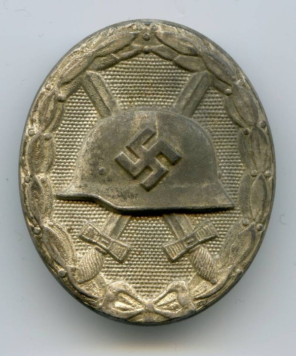 Silver Wound Badge by Carl Wild "107"