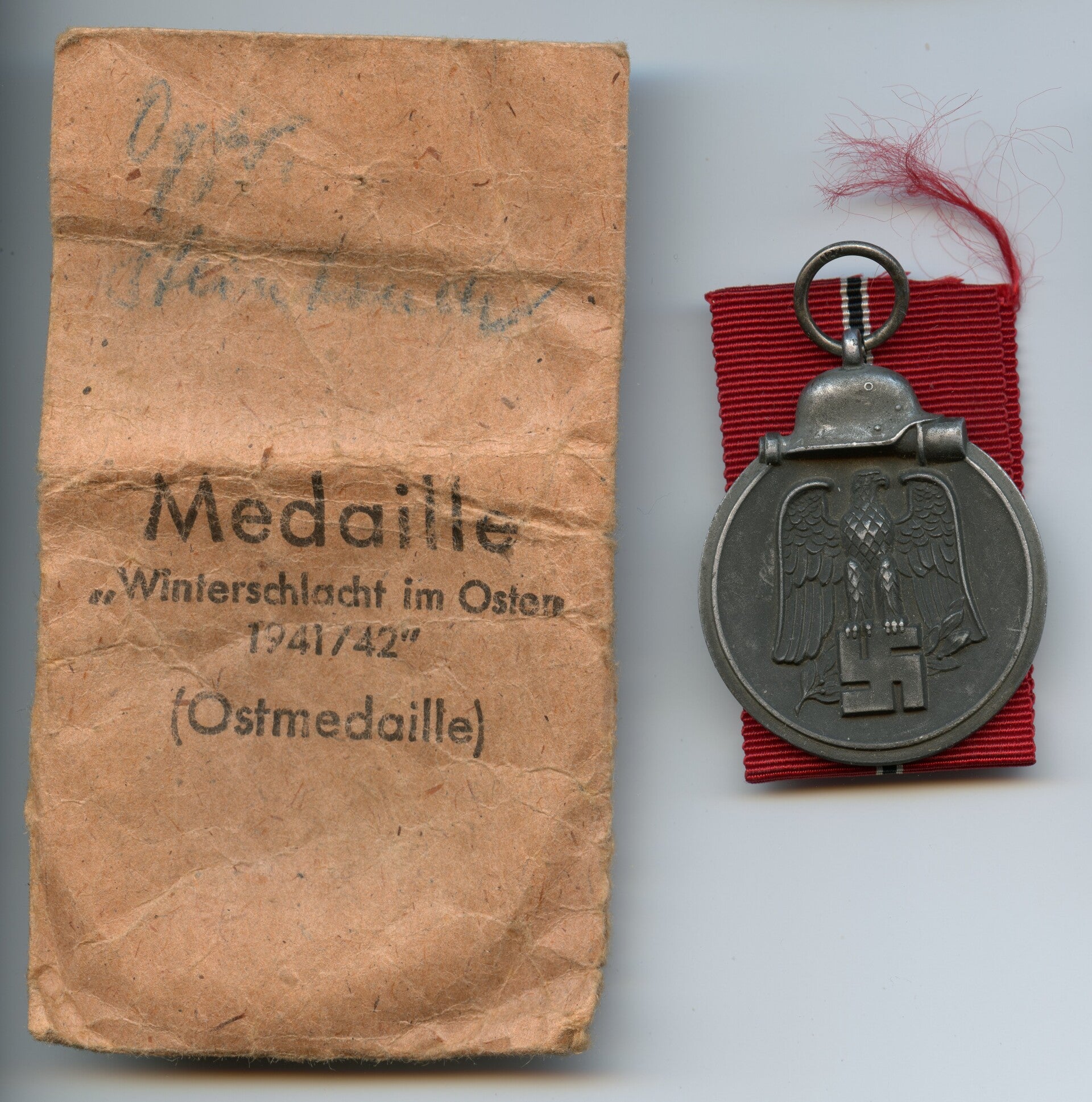 East Front Medal with pouch by Moritz Hausch AG "127"