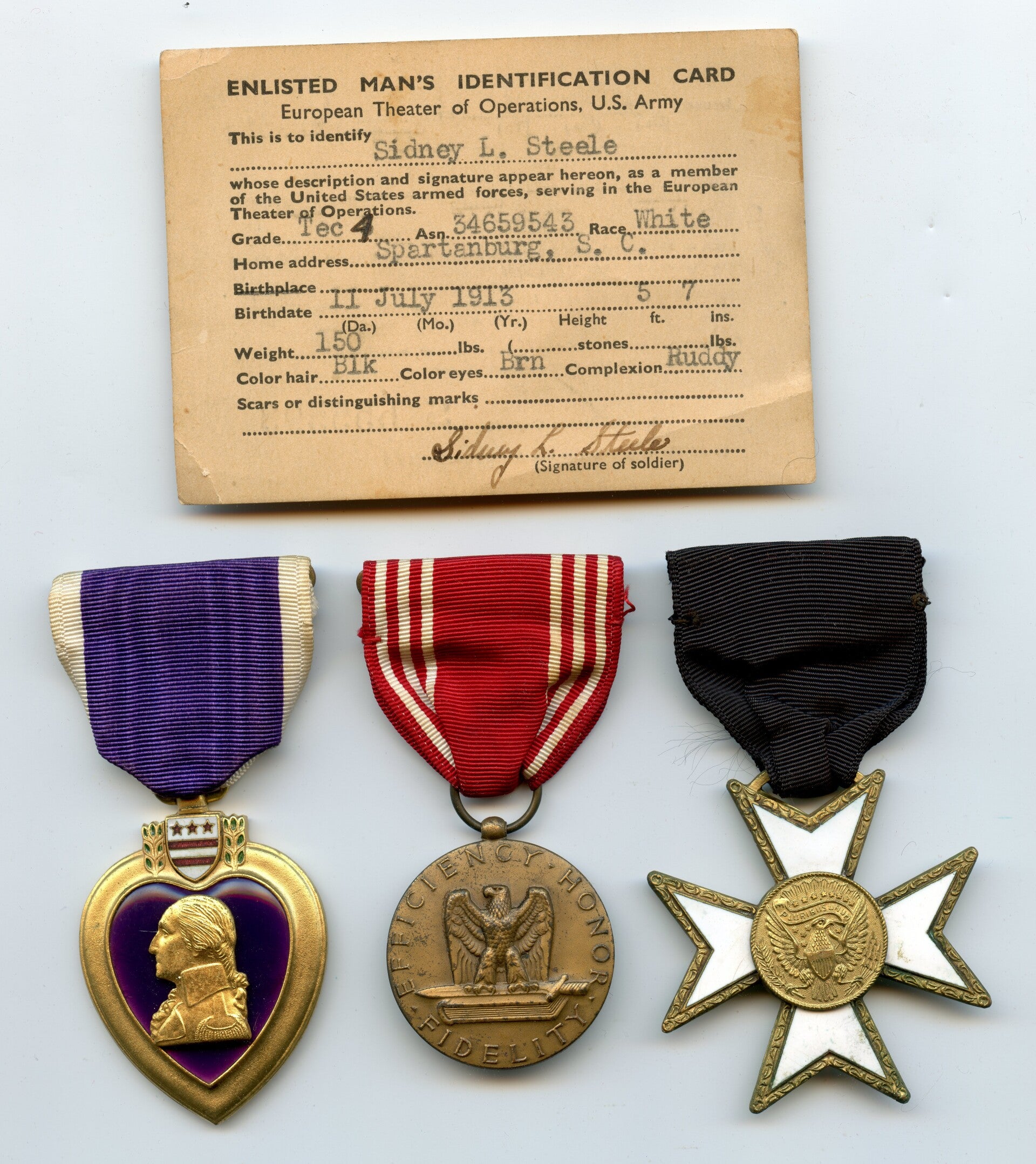 WW2 ID'ed Purple Heart Grouping, 980th Field Artillery Battalion, 7th Army Corps, Normandy/Ardennes/Rhineland/Central Europe