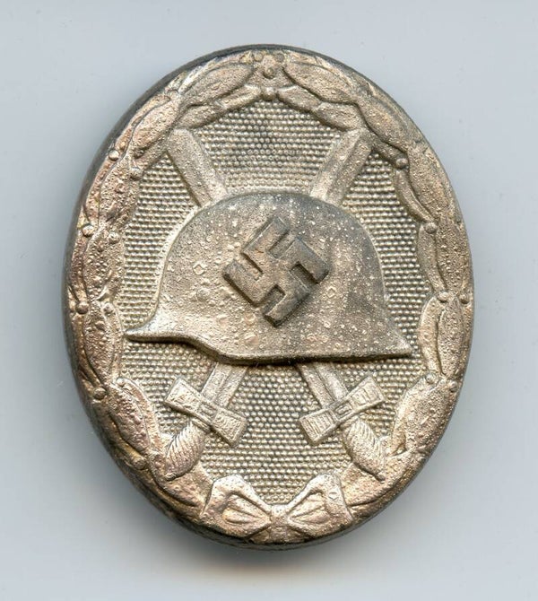 Silver Wound Badge by Carl Wild "107"