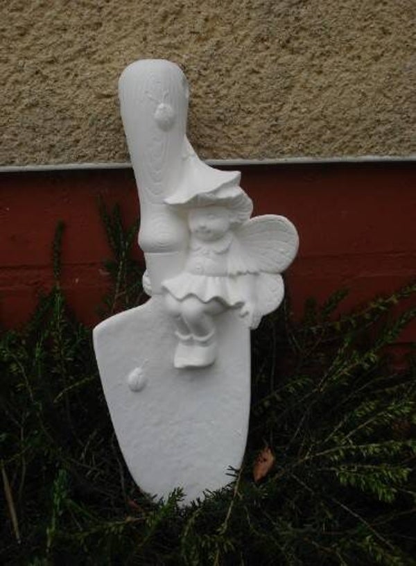 Kleine elf met schop