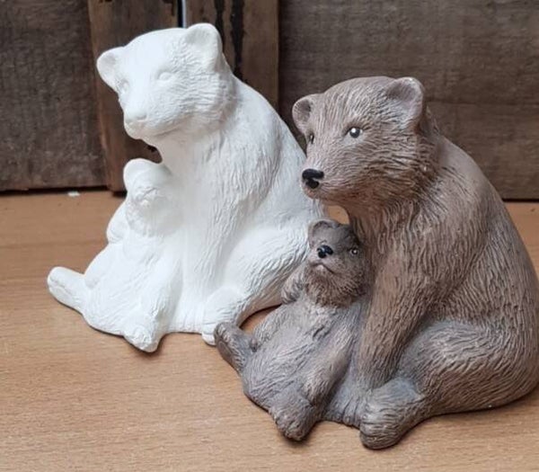 Kleine berenmoeder met jong