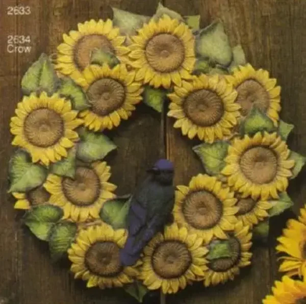 Zonnebloemkrans met vogel