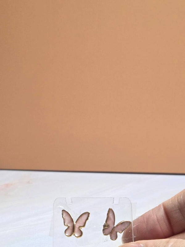 Vlinder oorstekers roze