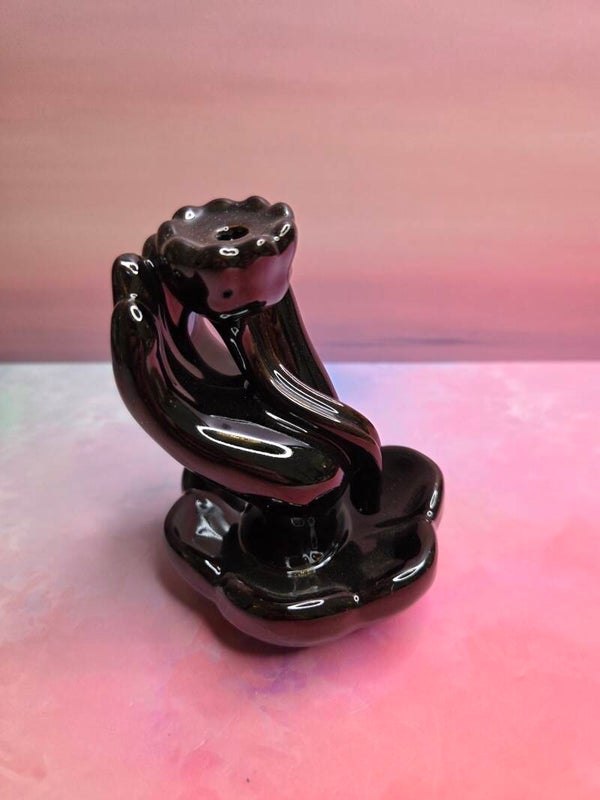 Hand met lotus - backflow