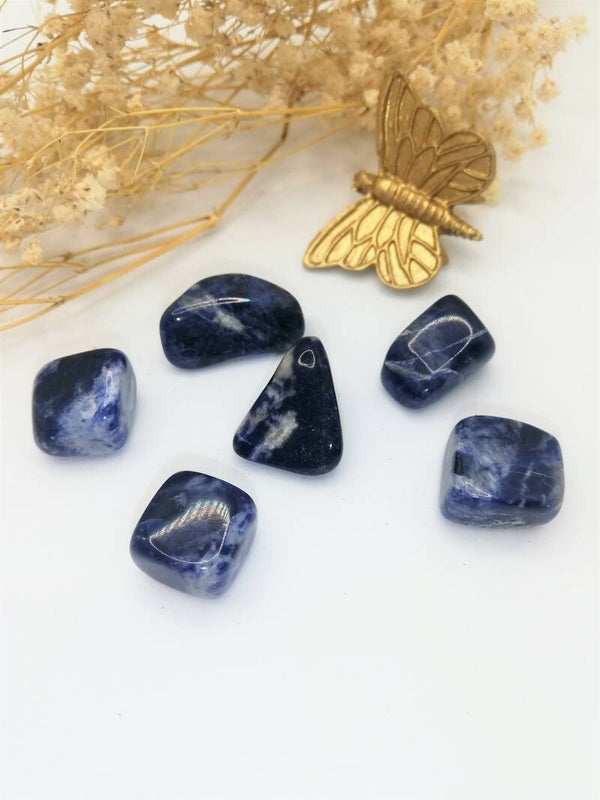 Sodaliet trommelsteen S-M