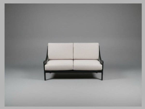 Vintage Scandinavian style two-seater sofa in black wood and new upholstery