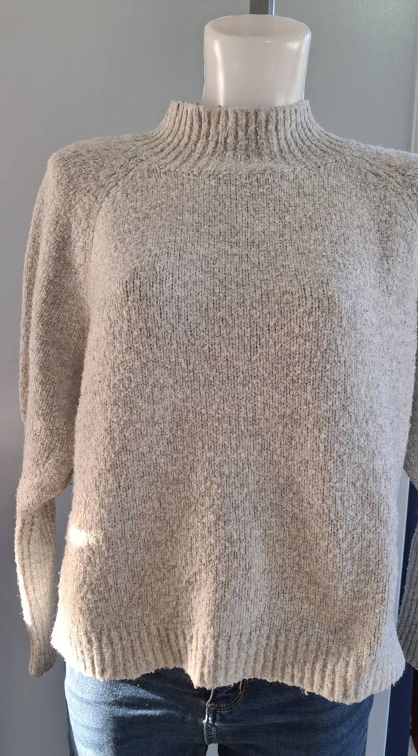 OL6 Pull crème In April 1986 T.U