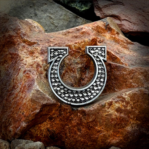 Omega pin/badge with skulls