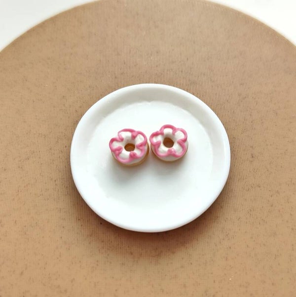 Donuts wit met roze bloem