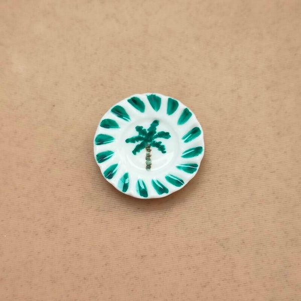 Keramieken bordje met palmboom