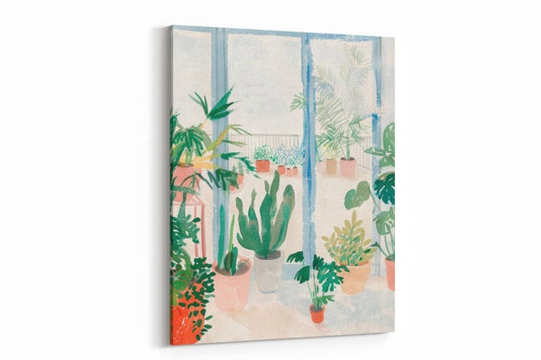 Raamuitzicht op een groene urban jungle met cactussen