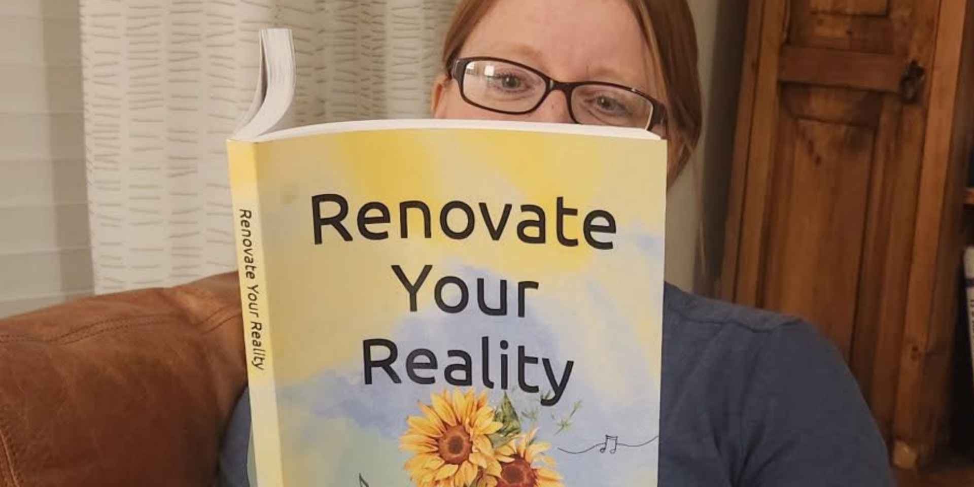 Woman reading Renovate Your Reality