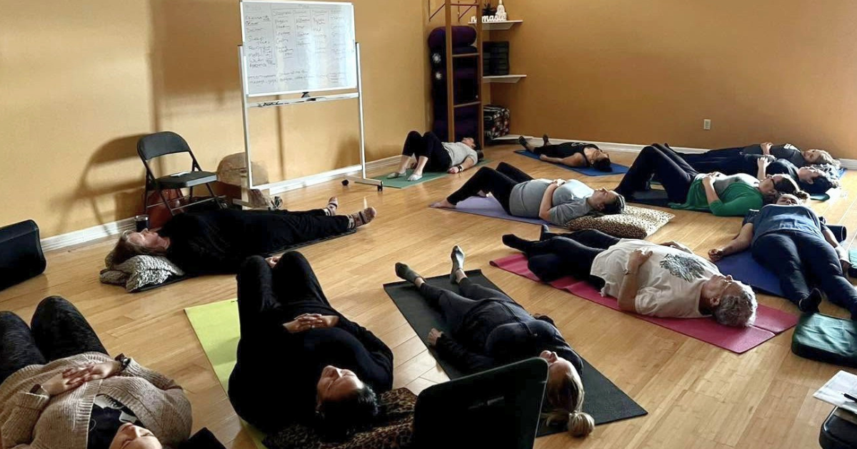 Women practicing meditation