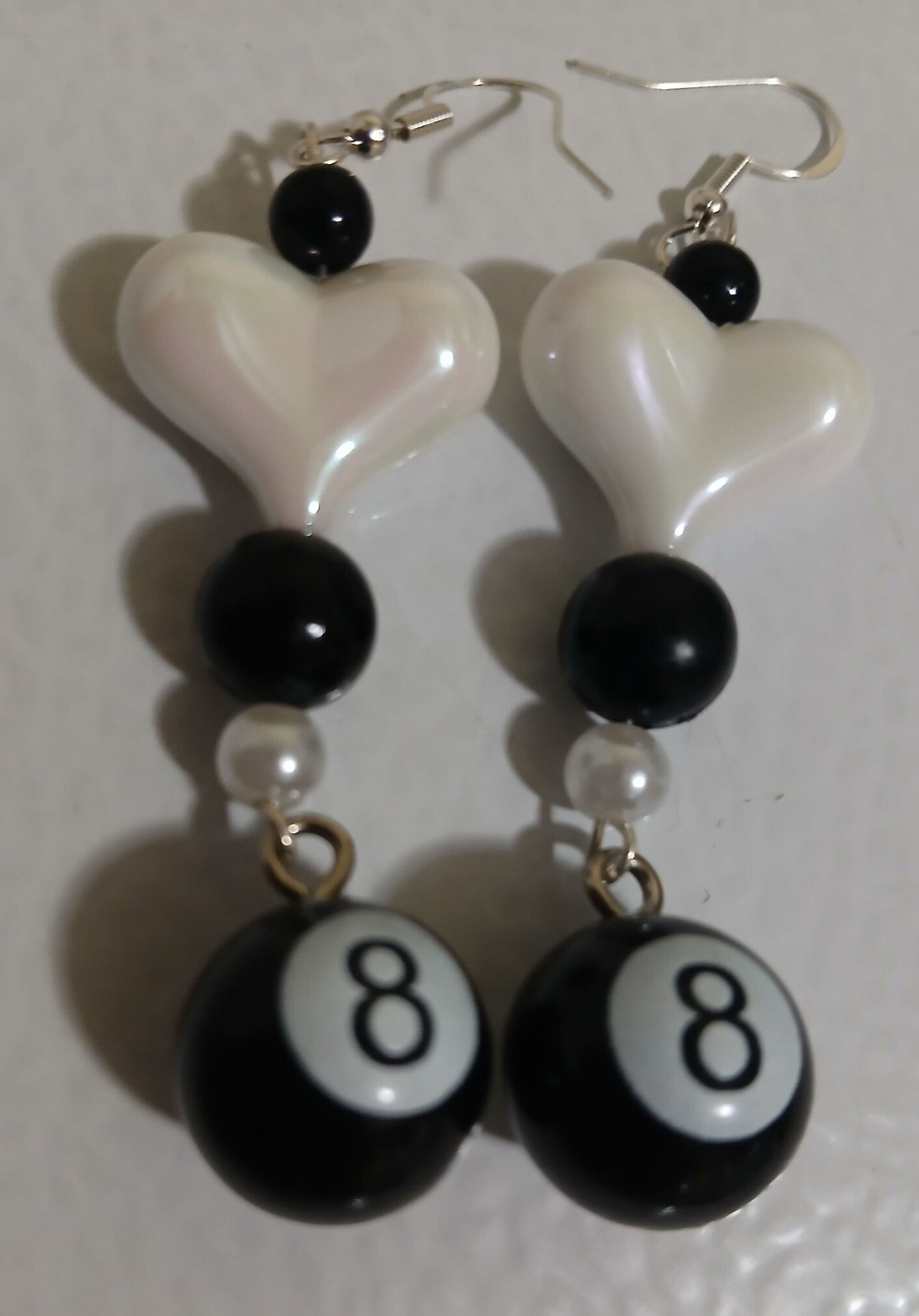 Dangle 8 Ball with white Hearts