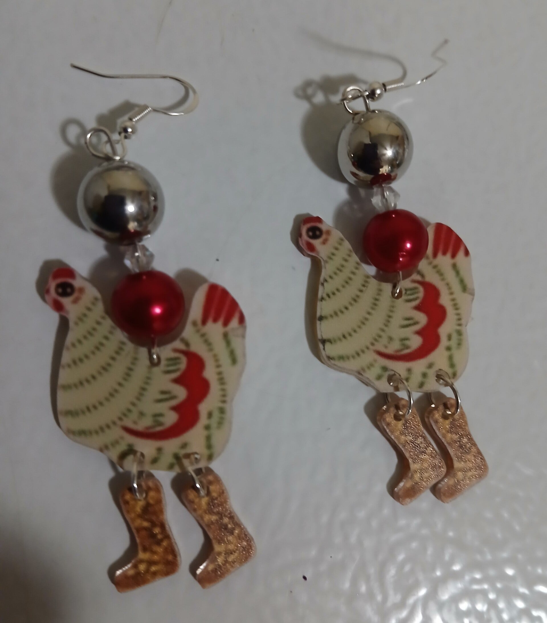Dangle Chicken with moving boots Red
