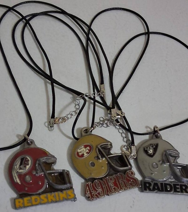 Mens football pendants with cords $20