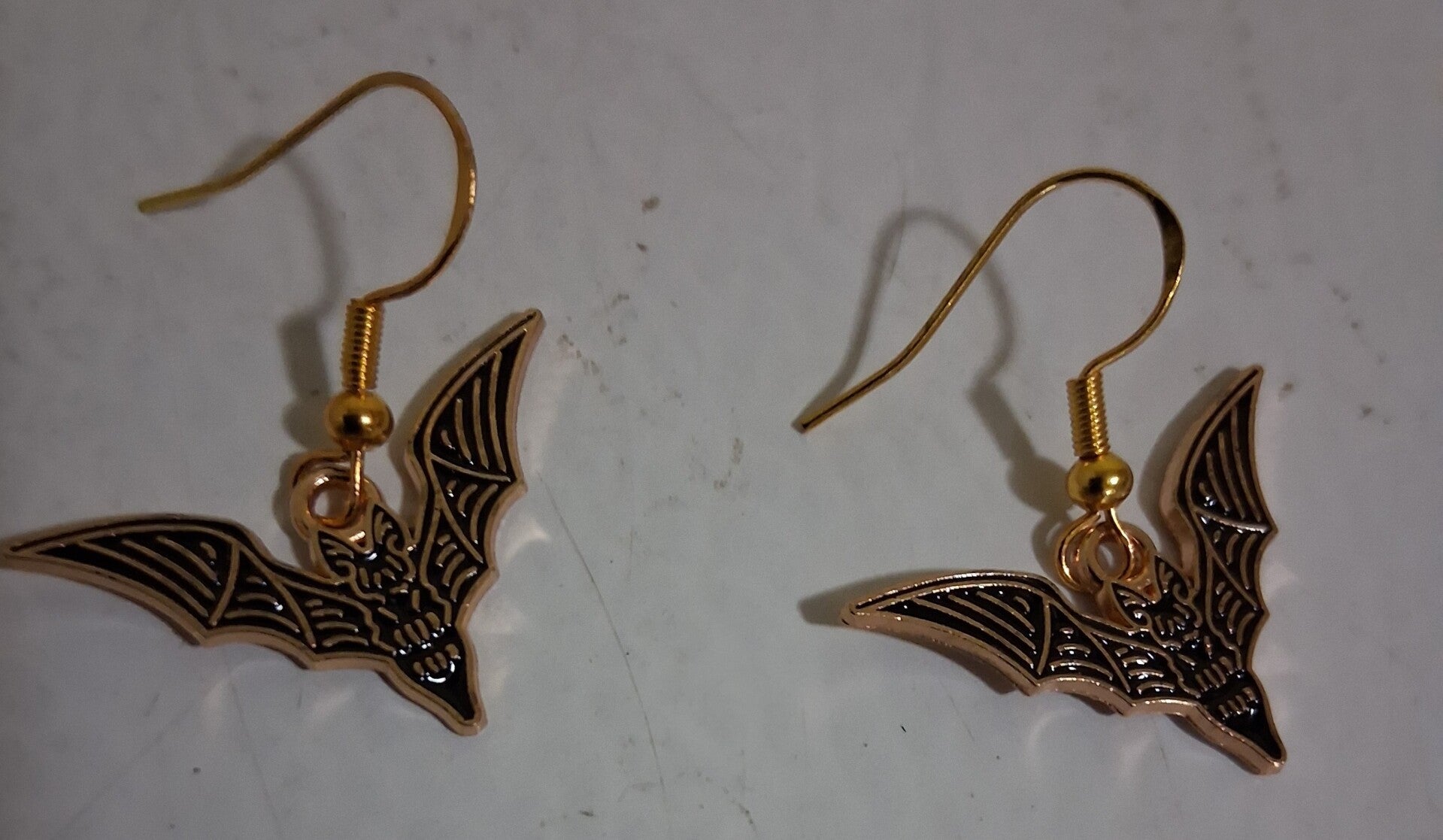 Posts with Bat Winged Gold