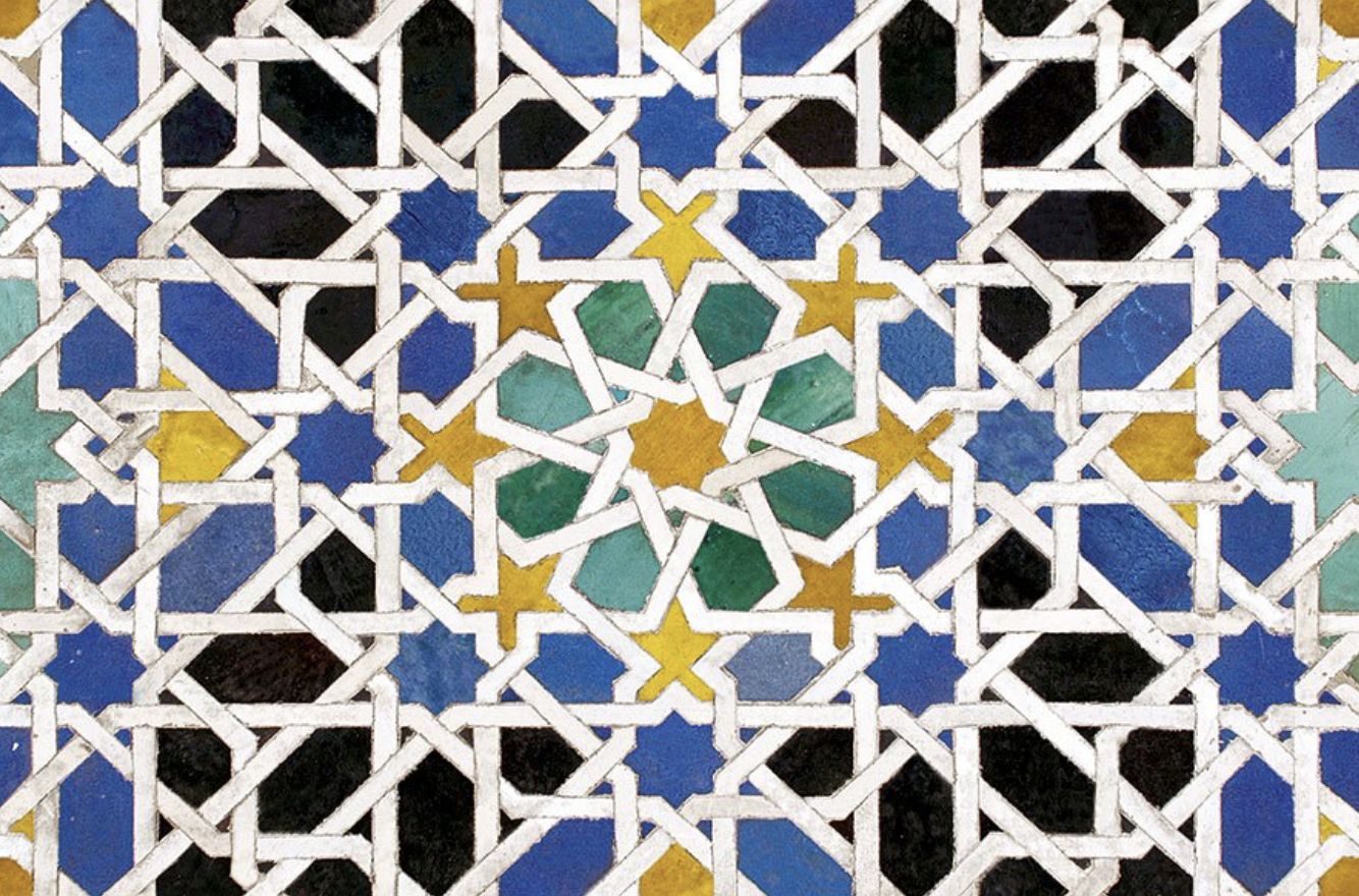 Tiling in the Mexuar of La Alhambra, Granada, Spain. It illustrates some basic principles of 2D geometric transformations such as translation and rotation, starting from a simple shape or motive: a square. Similar examples used in Maths Tutoring Sessions.