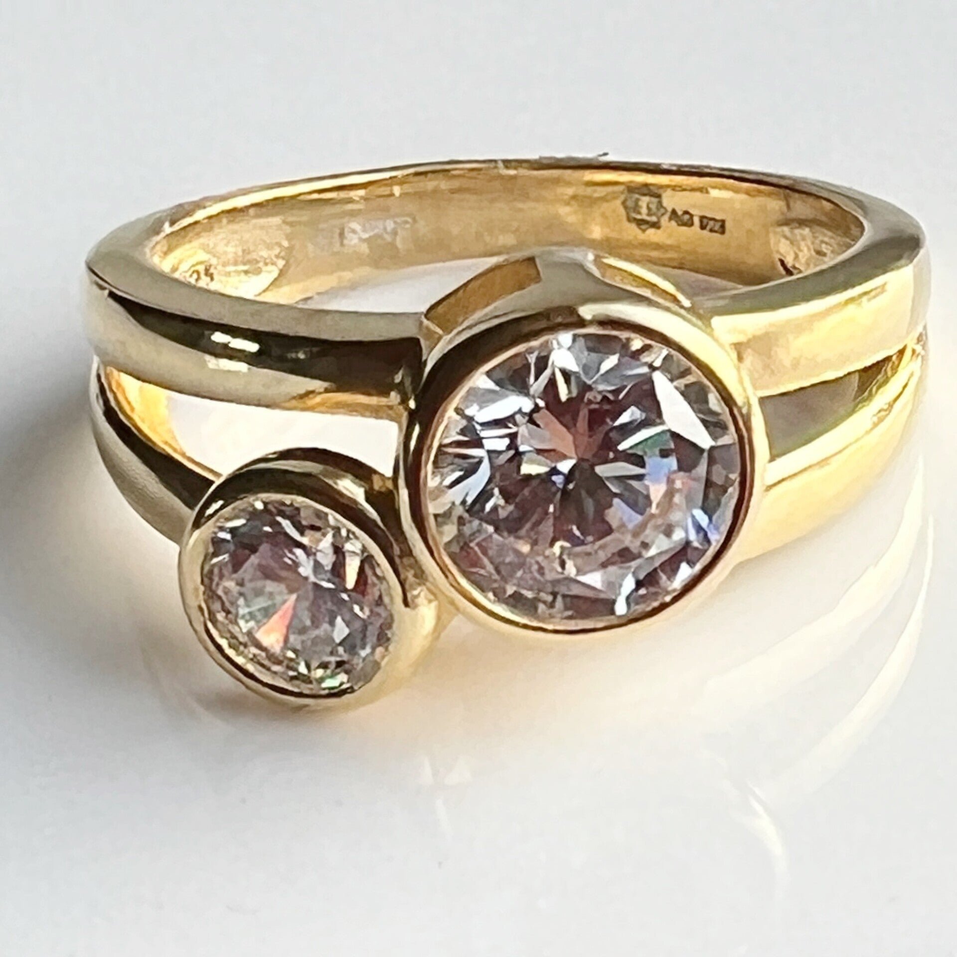 Goudkleurige zilveren ring met dubbele zirkonia - maat 17,5