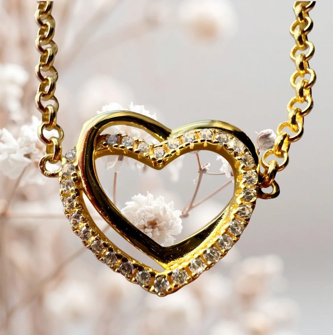 Goudkleurige armband met hart en zirkonia