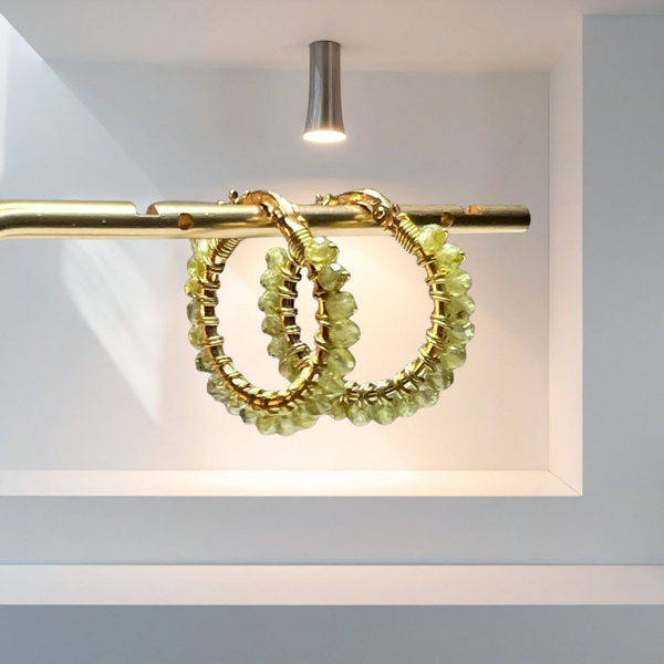 Verguld zilveren creolen met peridot