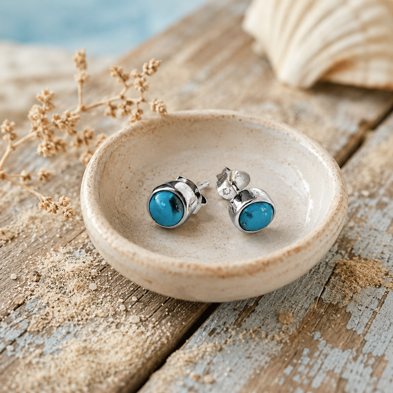 Zilveren oorknopjes met turquoise