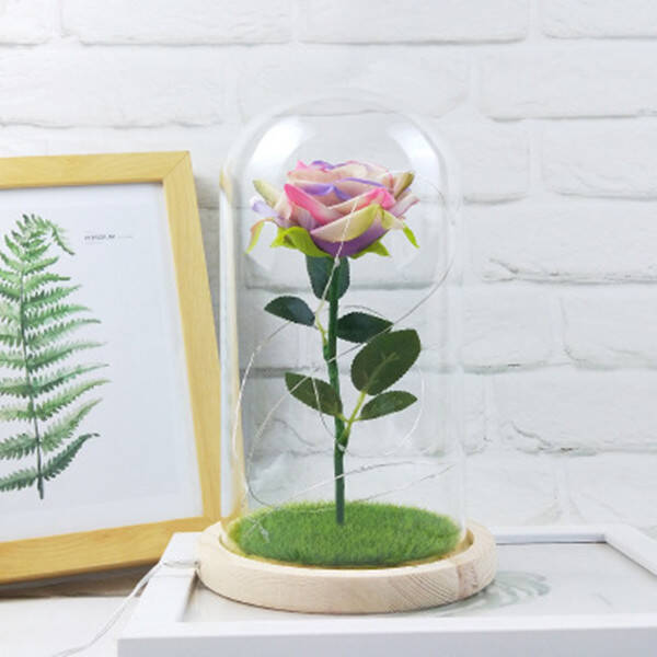Couvercle en verre de fleur artificielle