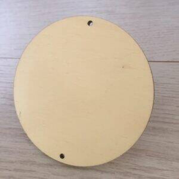 Schijf rond met 2 ophang gaten boven en onder hout