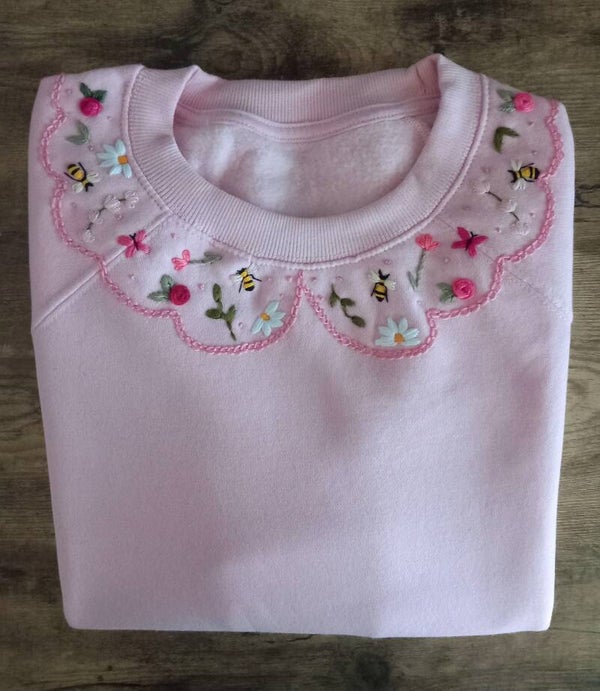 Felpa colletto fiorito