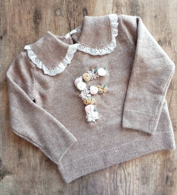 Maglioncino bimba iniziale fiorita