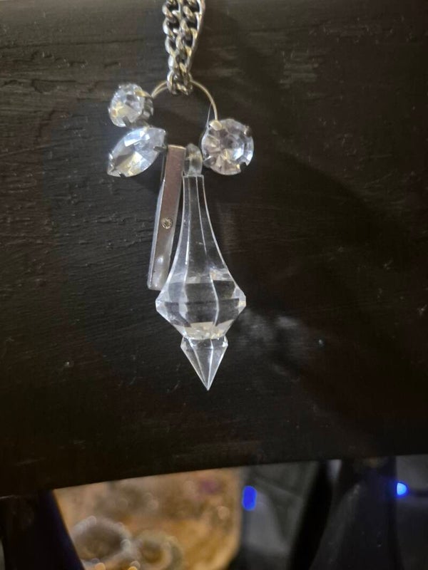 Custom sterling silver strength and beauty necklace.