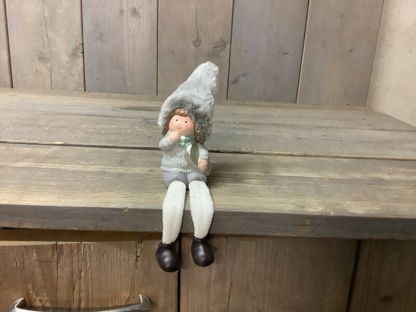 Winter poppetje met bungel benen